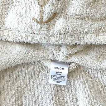 Close-up of plush fabric and bear ear hood on Baby Gap bathrobe