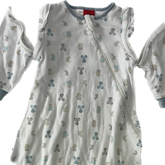 Baby wearing the Mice Design Organic Sleep Sack comfortably