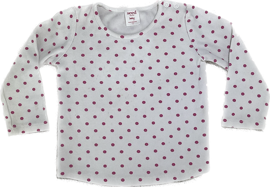 Front view of boat-neck polka dot long sleeve dress by Seed