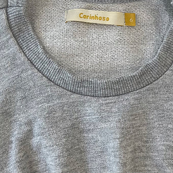 Folded pullover jumper showcasing soft knit texture