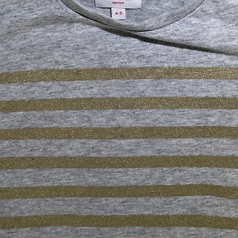 Close-up of fabric and stripe detail on girls Seed top