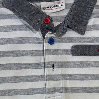 Close-up of cotton fabric and collar on boys striped shirt