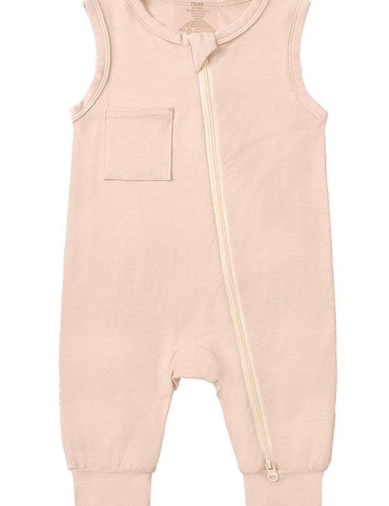Beloved Bubs sleeveless bamboo romper in soft cloud pink, flat lay front view – lightweight, breathable fabric with zipper for easy dressing.
