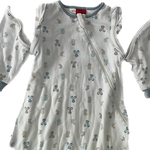 Baby wearing the Mice Design Organic Sleep Sack comfortably