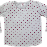 Front view of boat-neck polka dot long sleeve dress by Seed