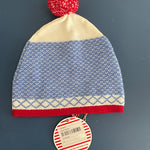 Side angle of the Cable Baby Aspen Beanie with Nordic knit design