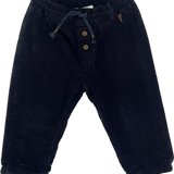 Front view of classic navy cord pants for women, size 00, H&M.