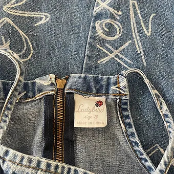 Back view of Ladybird Girls Denim XOX Dress in blue denim