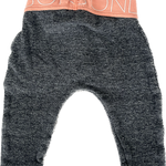 Close-up of the waistband on Bonds grey baby leggings for newborns.