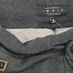 Close-up of adjustable waistband on grey boys track pants