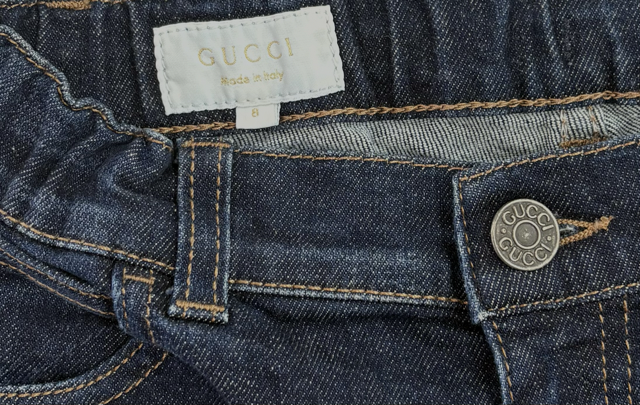 Back pocket stitching detail on Gucci kid's straight-leg jeans