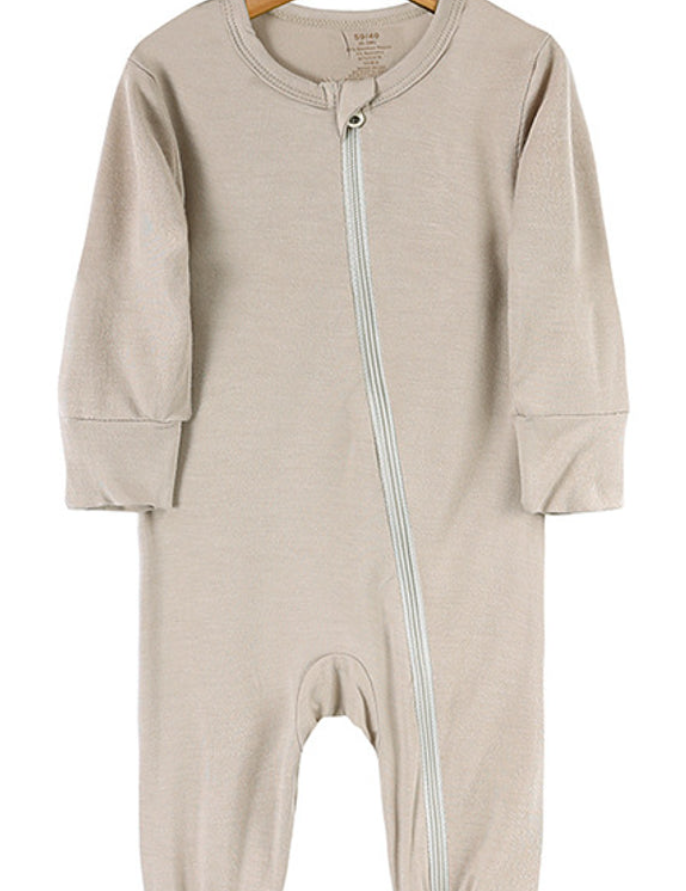 Beloved Bubs sleeveless bamboo romper in soft cloud pink, front view – baby jumpsuit made from breathable bamboo-spandex fabric.