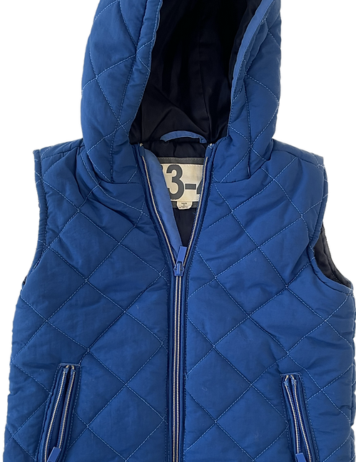 Front view of toddler boys blue puffy vest size 3-5